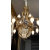 Lustre en bronze doré, cristaux surmonté de 12 flammes de verre. Réf: 328 | Biron Lustre en bronze doré, cristaux surmonté de 12 flammes de verre. Réf: 328