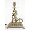 Paire de bougeoirs à main du 19ème siècle en bronze au motif de chimère.