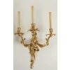 Suite de quatre appliques de style Louis XV, époque Napoléon III (1848 – 1870). | Biron Suite de quatre appliques de style Louis XV, époque Napoléon III (1848 - 1870).