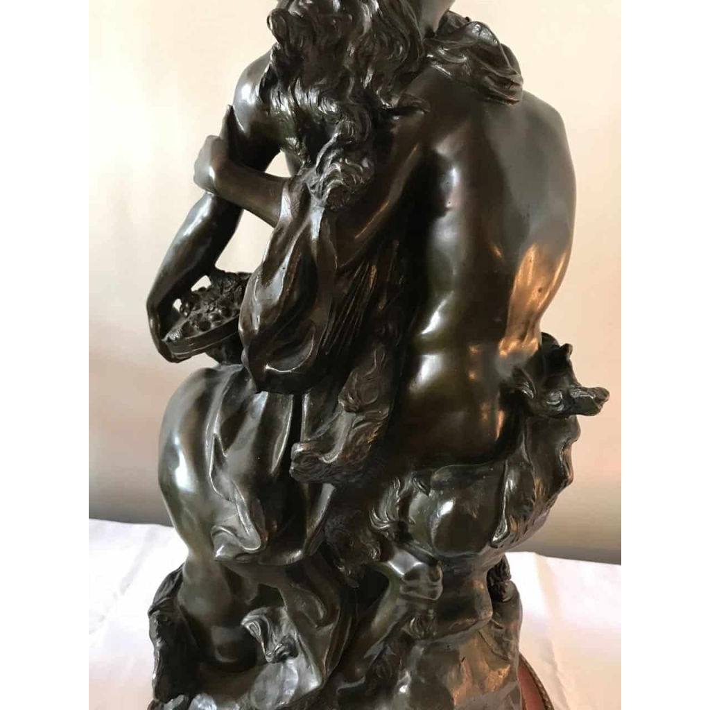 Bronze à patine brune sur socle de marbre griotte, rotatif « L’éducation de Bacchus » par Clodion. Ref: Charles 02. | Biron Bronze à patine brune sur socle de marbre griotte, rotatif "L'éducation de Bacchus" par Clodion. Ref: Charles 02.