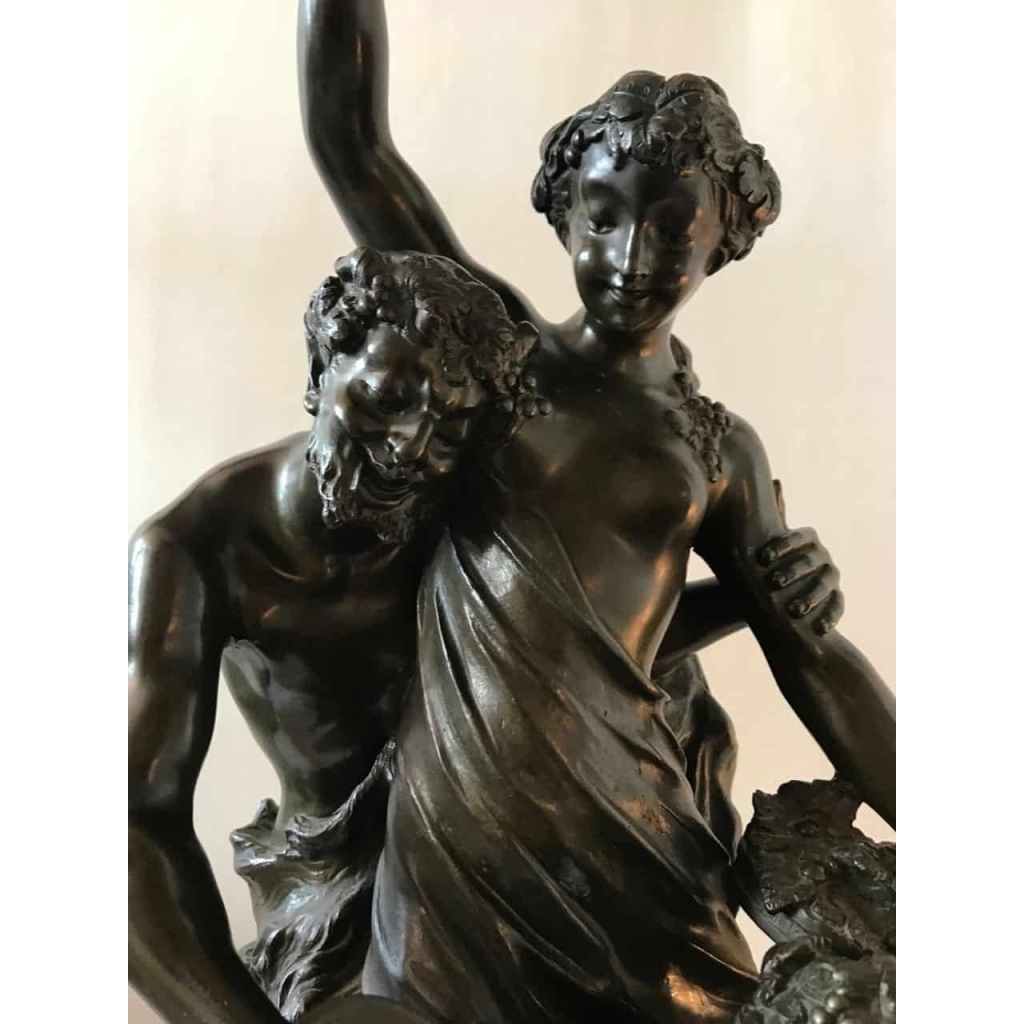 Bronze à patine brune sur socle de marbre griotte, rotatif « L’éducation de Bacchus » par Clodion. Ref: Charles 02. | Biron Bronze à patine brune sur socle de marbre griotte, rotatif "L'éducation de Bacchus" par Clodion. Ref: Charles 02.