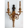 1900′ Paire d Appliques à Deux Bras de Lumière de Style Louis XVI en Bronze Doré d’Après un Modèle de Jean HAURE à Décor de Bustes d’Enfants Musiciens | Biron 1900' Paire d Appliques à Deux Bras de Lumière de Style Louis XVI en Bronze Doré d'Après un Modèle de Jean HAURE à Décor de Bustes d'Enfants Musiciens