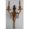 1900′ Paire d Appliques à Deux Bras de Lumière de Style Louis XVI en Bronze Doré d’Après un Modèle de Jean HAURE à Décor de Bustes d’Enfants Musiciens | Biron 1900' Paire d Appliques à Deux Bras de Lumière de Style Louis XVI en Bronze Doré d'Après un Modèle de Jean HAURE à Décor de Bustes d'Enfants Musiciens