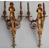 1900′ Paire d Appliques à Deux Bras de Lumière de Style Louis XVI en Bronze Doré d’Après un Modèle de Jean HAURE à Décor de Bustes d’Enfants Musiciens | Biron 1900' Paire d Appliques à Deux Bras de Lumière de Style Louis XVI en Bronze Doré d'Après un Modèle de Jean HAURE à Décor de Bustes d'Enfants Musiciens