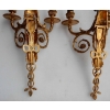 1900′ Paire d Appliques à Deux Bras de Lumière de Style Louis XVI en Bronze Doré d’Après un Modèle de Jean HAURE à Décor de Bustes d’Enfants Musiciens | Biron 1900' Paire d Appliques à Deux Bras de Lumière de Style Louis XVI en Bronze Doré d'Après un Modèle de Jean HAURE à Décor de Bustes d'Enfants Musiciens