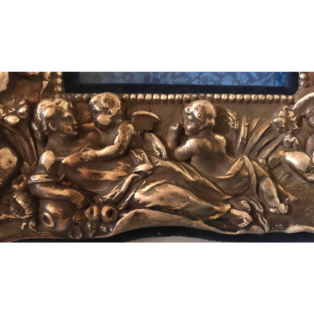 Paire de cadres en argent repoussé. Réf: 235/236. | Biron Paire de cadres en argent repoussé. Réf: 235/236.