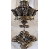 Porte cigares, boite d’allumettes et lampe à huile, en bronze argenté, à motifs égyptiens, monogrammé E.L. Réf: 299 | Biron Porte cigares, boite d'allumettes et lampe à huile, en bronze argenté, à motifs égyptiens, monogrammé E.L. Réf: 299