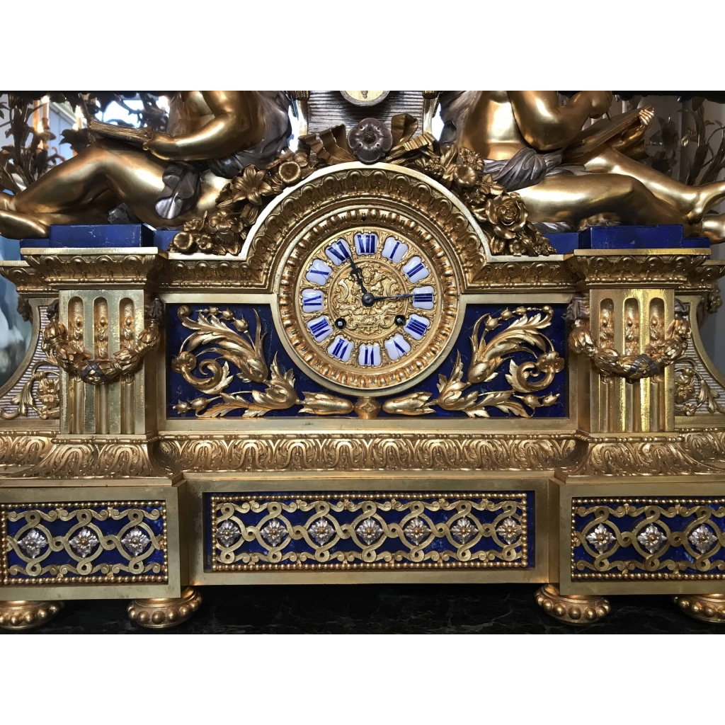 Garniture, horloge et ses 2 candélabres en bronze doré et lapis-lazuli. Réf: 375. | Biron Garniture, horloge et ses 2 candélabres en bronze doré et lapis-lazuli. Réf: 375.
