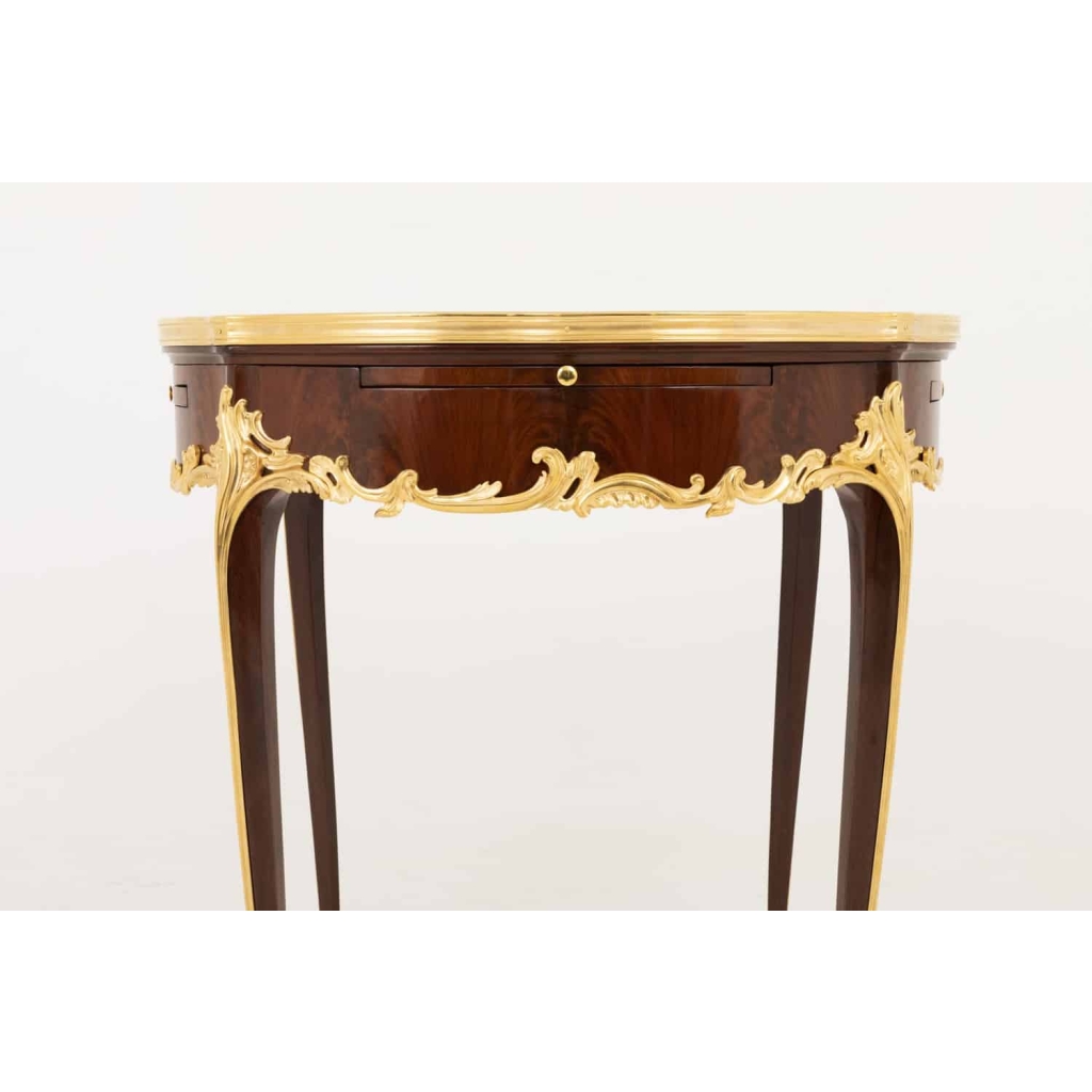 Table bouillotte de style Louis XV en bois de violette, fin XIXe siècle