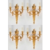Suite de quatre appliques de style Louis XVI. | Biron |||||
