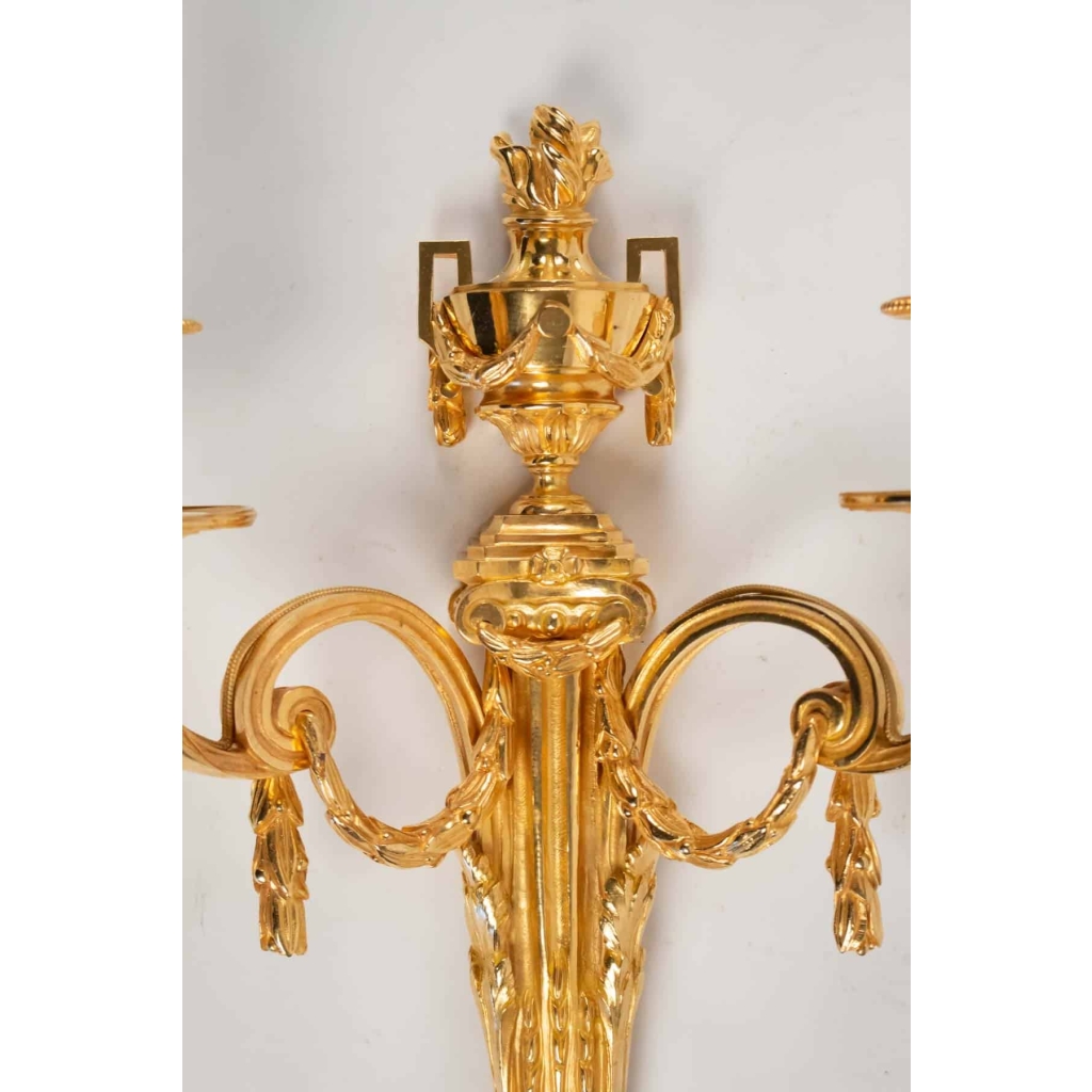 Suite de quatre appliques de style Louis XVI. | Biron Suite de quatre appliques de style Louis XVI.