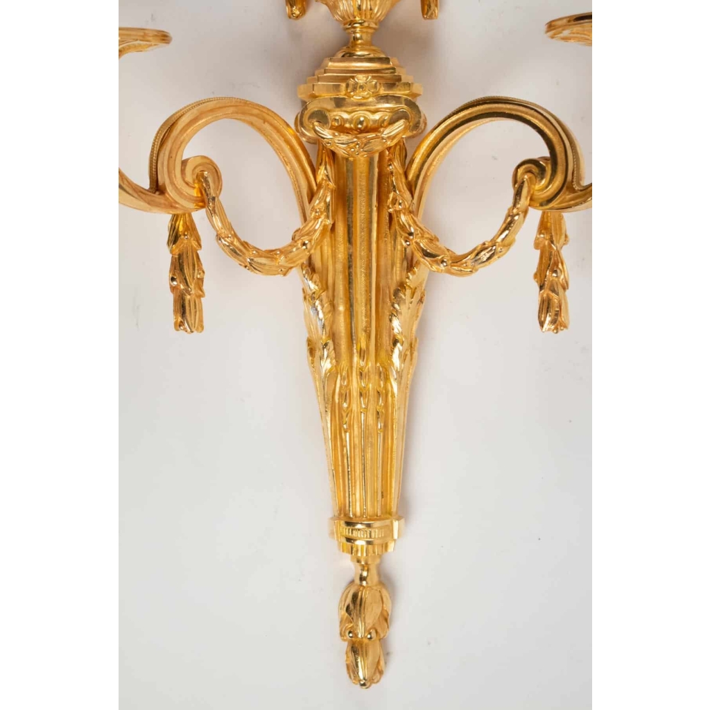 Suite de quatre appliques de style Louis XVI. | Biron Suite de quatre appliques de style Louis XVI.