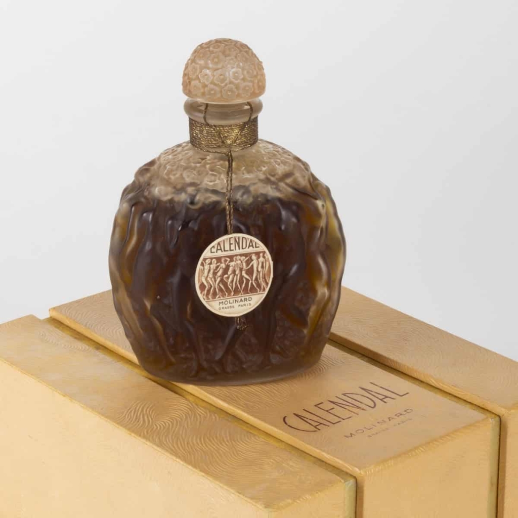 Flacon « Calendal » verre blanc patiné sépia scellé avec boîte, jus d'origine et étiquette de René LALIQUE pour MOLINARD
