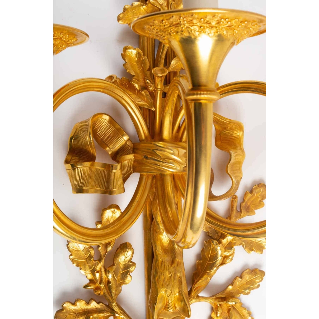 Suite de quatre importantes appliques de style Louis XVI. | Biron Suite de quatre importantes appliques de style Louis XVI.