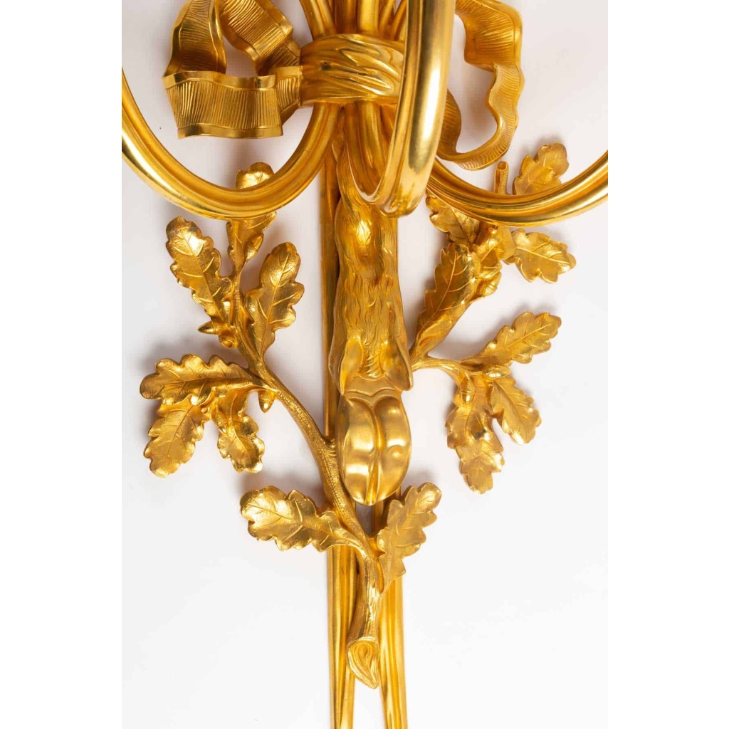 Suite de quatre importantes appliques de style Louis XVI. | Biron Suite de quatre importantes appliques de style Louis XVI.
