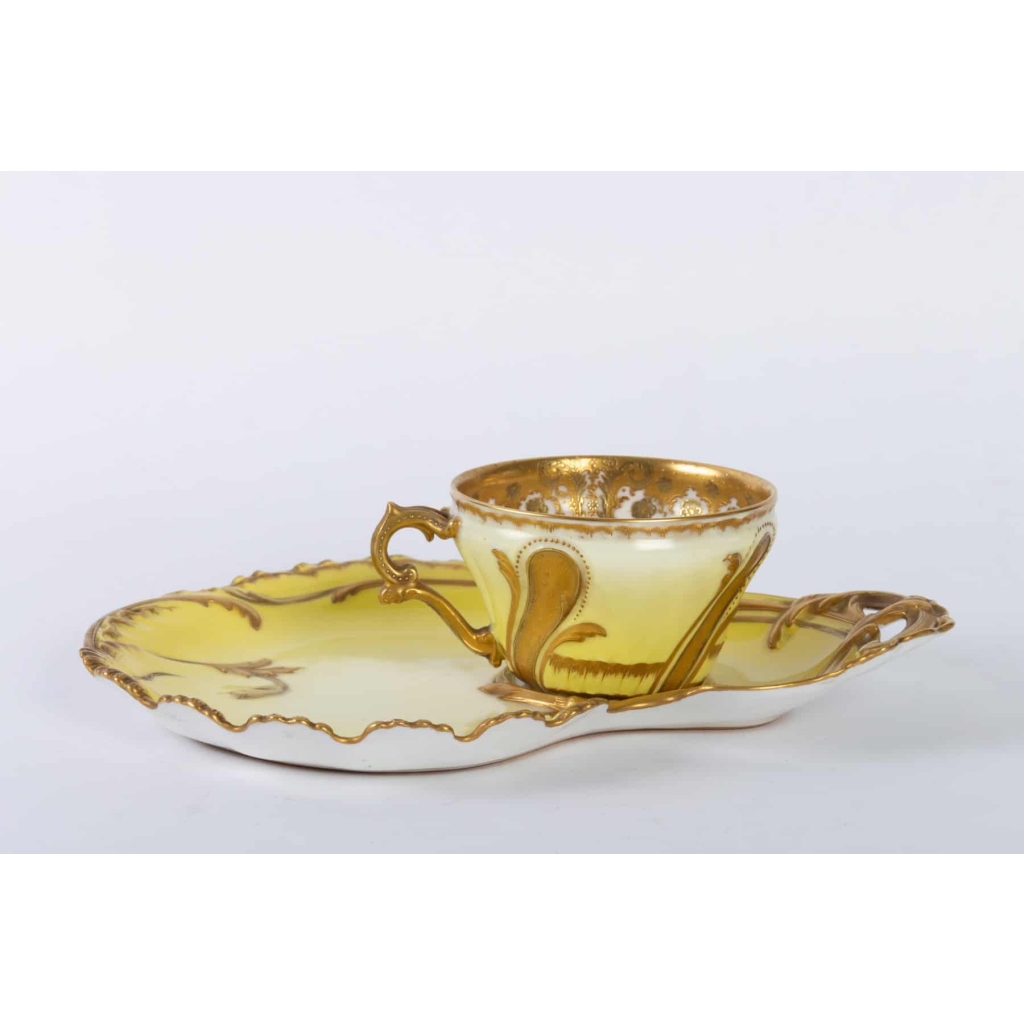 Tasse jaune et or rocaille Haviland 1890 | Biron Tasse jaune et or rocaille Haviland 1890