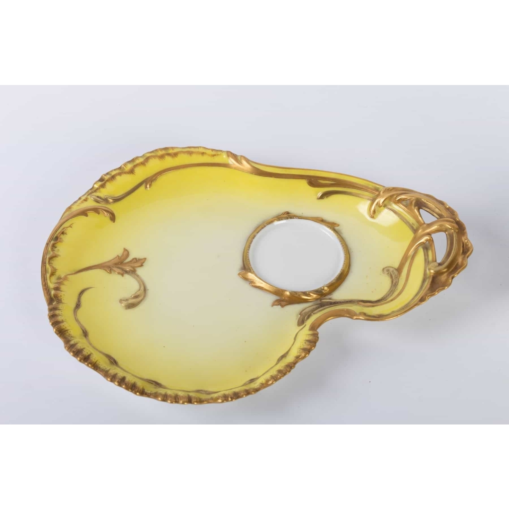 Tasse jaune et or rocaille Haviland 1890 | Biron Tasse jaune et or rocaille Haviland 1890