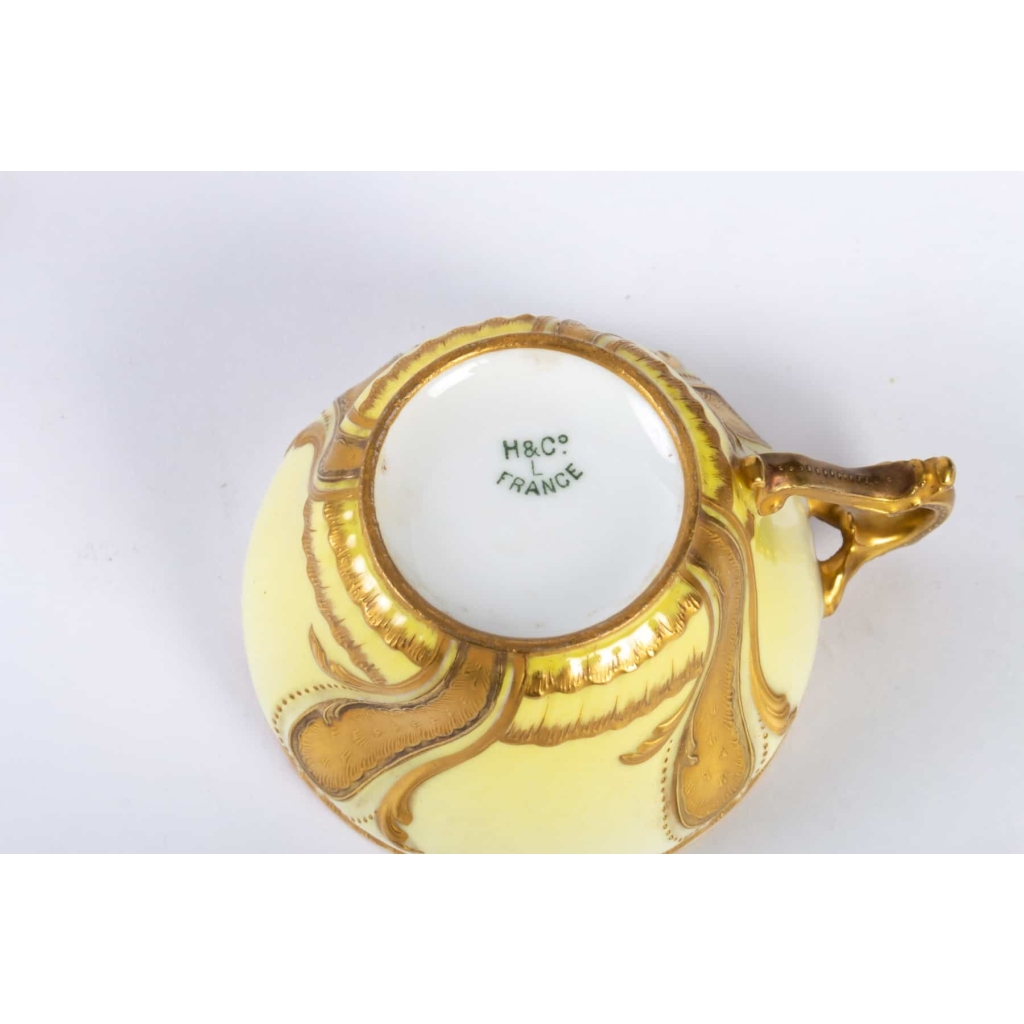 Tasse jaune et or rocaille Haviland 1890 | Biron Tasse jaune et or rocaille Haviland 1890