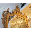 Important miroir Louis XV en bois doré d’époque Napoléon III. | Biron Important miroir Louis XV en bois doré d'époque Napoléon III.