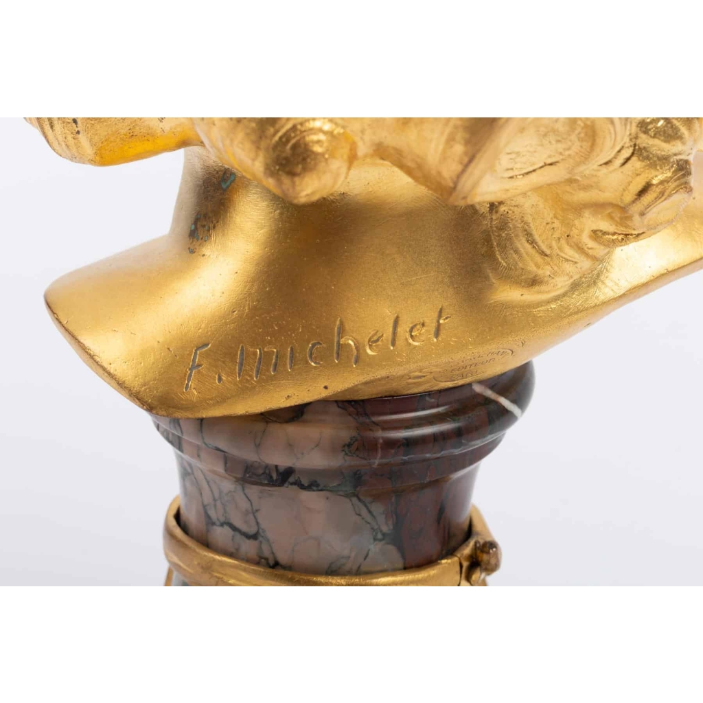 Sculpture tête d’enfant en bronze doré et marbre de MICHELET 20e siècle | Biron Sculpture tête d'enfant en bronze doré et marbre de MICHELET 20e siècle