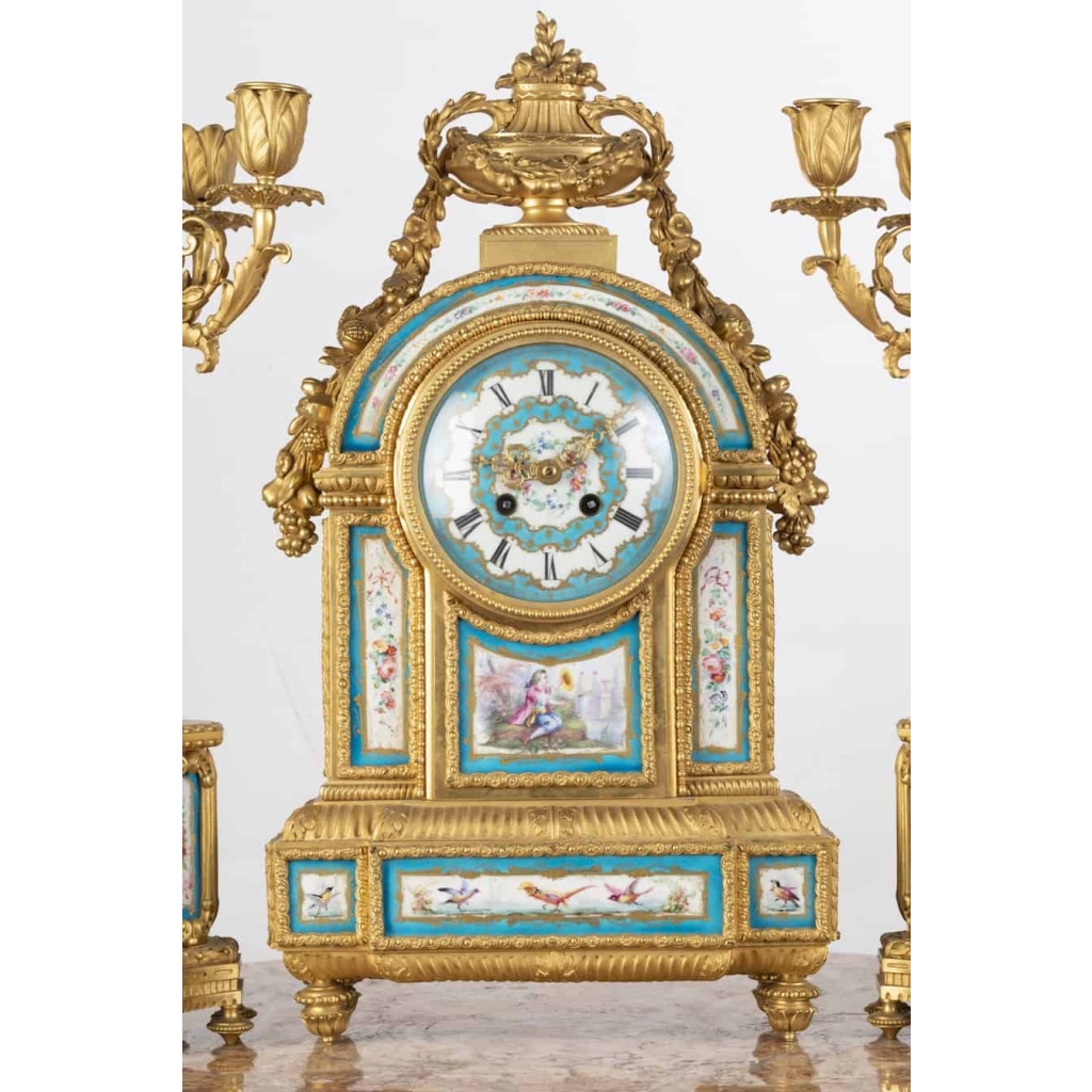 A French 19th Century Louis XVI St. Ormulu and Sèvres Porcelain Garniture. | Biron A French 19th Century Louis XVI St. Ormulu and Sèvres Porcelain Garniture.