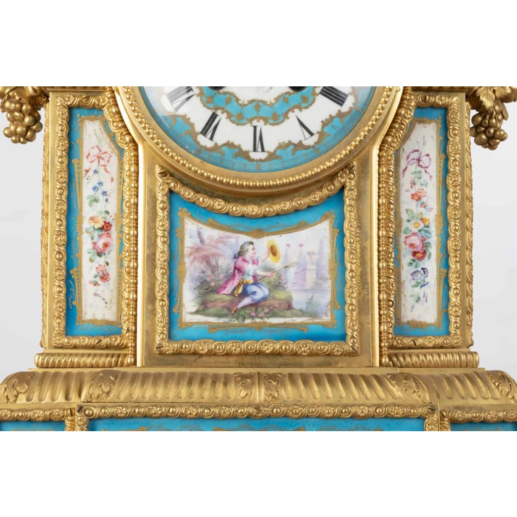 A French 19th Century Louis XVI St. Ormulu and Sèvres Porcelain Garniture. | Biron A French 19th Century Louis XVI St. Ormulu and Sèvres Porcelain Garniture.