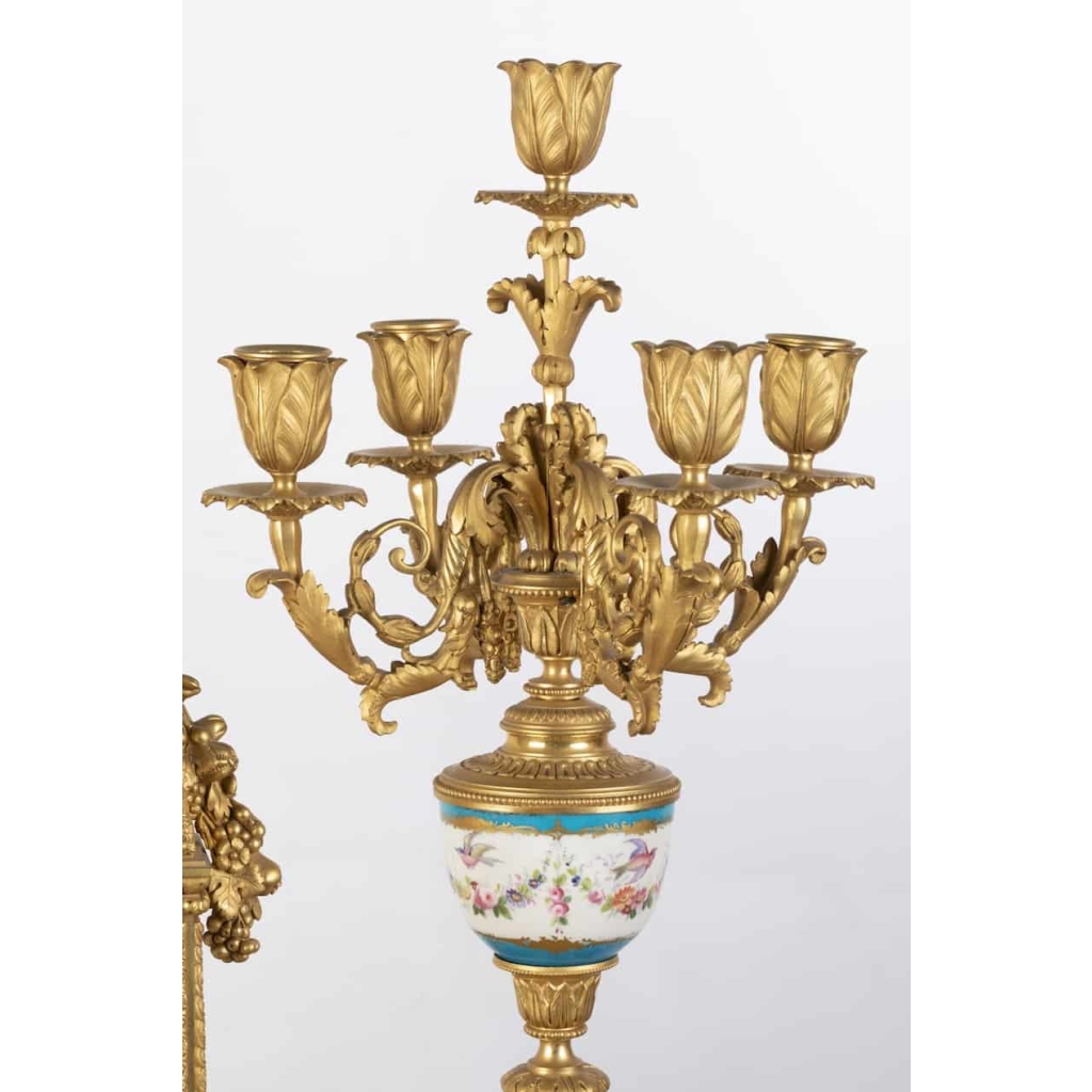 A French 19th Century Louis XVI St. Ormulu and Sèvres Porcelain Garniture. | Biron A French 19th Century Louis XVI St. Ormulu and Sèvres Porcelain Garniture.