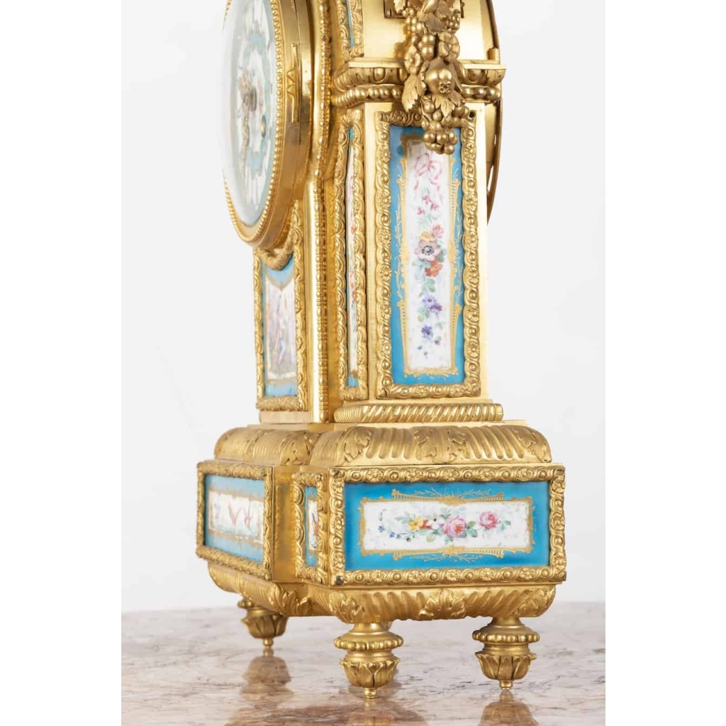 A French 19th Century Louis XVI St. Ormulu and Sèvres Porcelain Garniture. | Biron A French 19th Century Louis XVI St. Ormulu and Sèvres Porcelain Garniture.