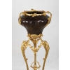 A French 19th Century Guilt and Patinated Bronze Jardinière on Stand.
