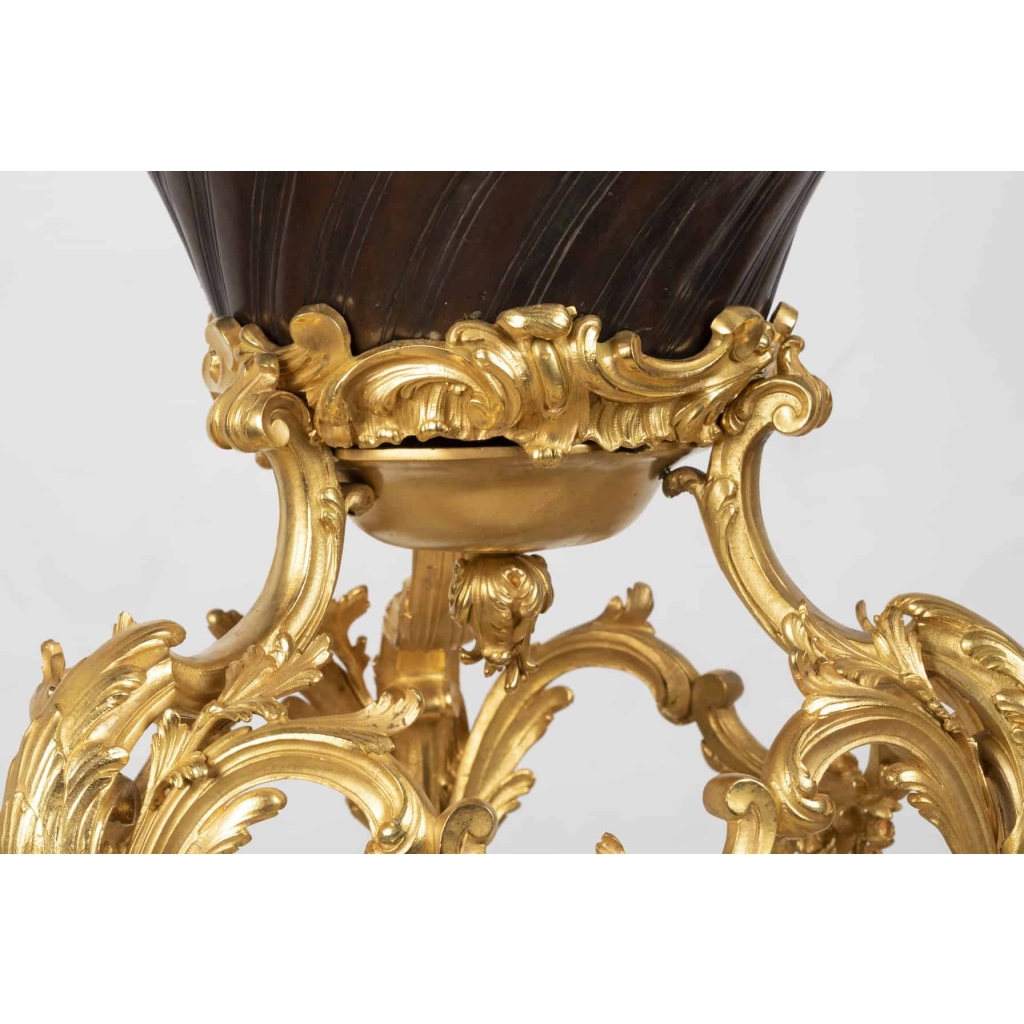 A French 19th Century Guilt and Patinated Bronze Jardinière on Stand.