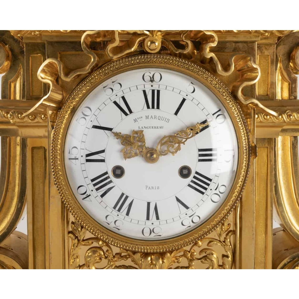 A French 19th Century Ormulu Mantel Clock by Maison Marquis.