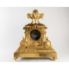 A French 19th Century Ormulu Mantel Clock by Maison Marquis.