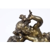 A charming and wonderfully detailed French late 19th century « medaillion patina » bronze statue signed by Ralph Charles | Biron A charming and wonderfully detailed French late 19th century « medaillion patina » bronze statue signed by Ralph Charles