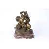 A charming and wonderfully detailed French late 19th century « medaillion patina » bronze statue signed by Ralph Charles | Biron A charming and wonderfully detailed French late 19th century « medaillion patina » bronze statue signed by Ralph Charles