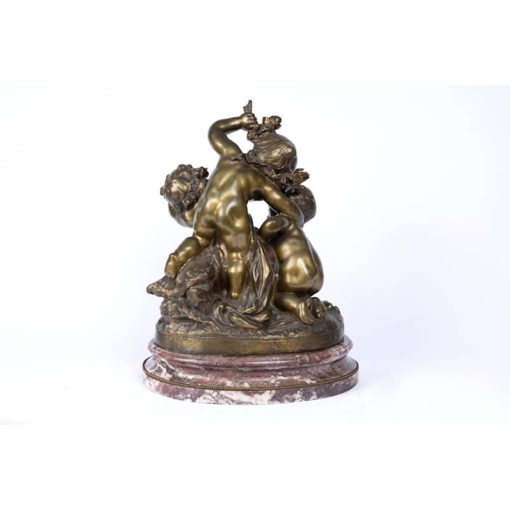 A charming and wonderfully detailed French late 19th century « medaillion patina » bronze statue signed by Ralph Charles | Biron A charming and wonderfully detailed French late 19th century « medaillion patina » bronze statue signed by Ralph Charles