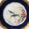 Douze Assiettes en porcelaine de Limoges à décors de poissons pour " Emile Bourgeois à Paris "XIXème