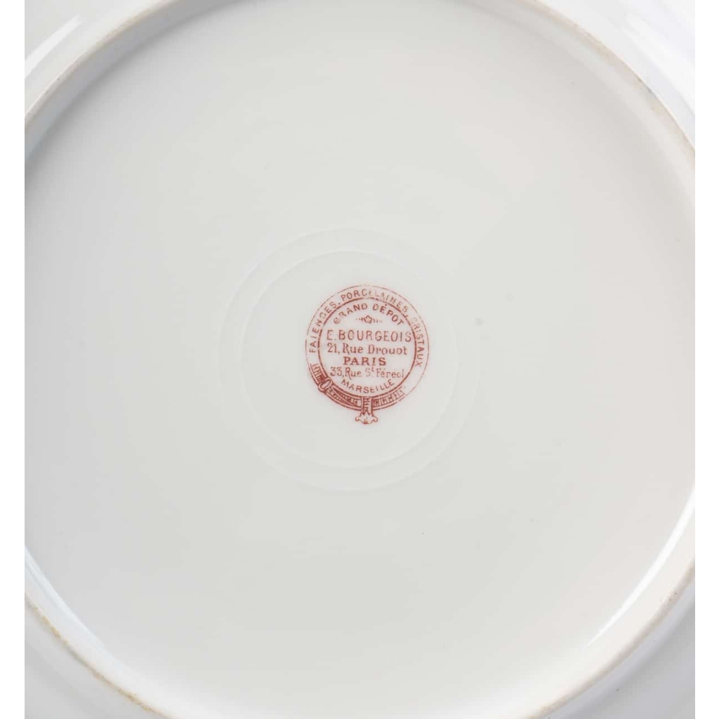 Douze Assiettes en porcelaine de Limoges à décors de poissons pour " Emile Bourgeois à Paris "XIXème