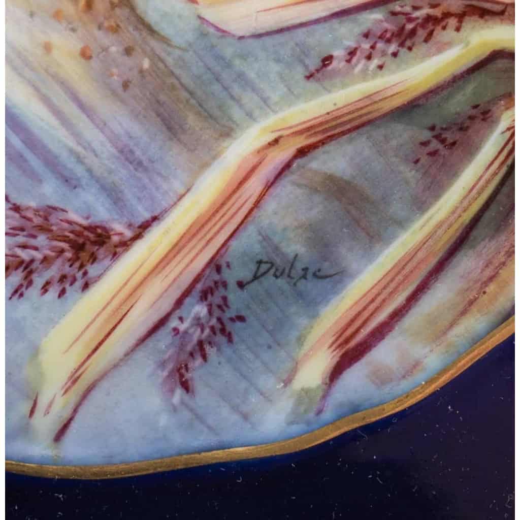Douze Assiettes en porcelaine de Limoges à décors de poissons pour " Emile Bourgeois à Paris "XIXème
