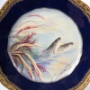 Douze Assiettes en porcelaine de Limoges à décors de poissons pour " Emile Bourgeois à Paris "XIXème