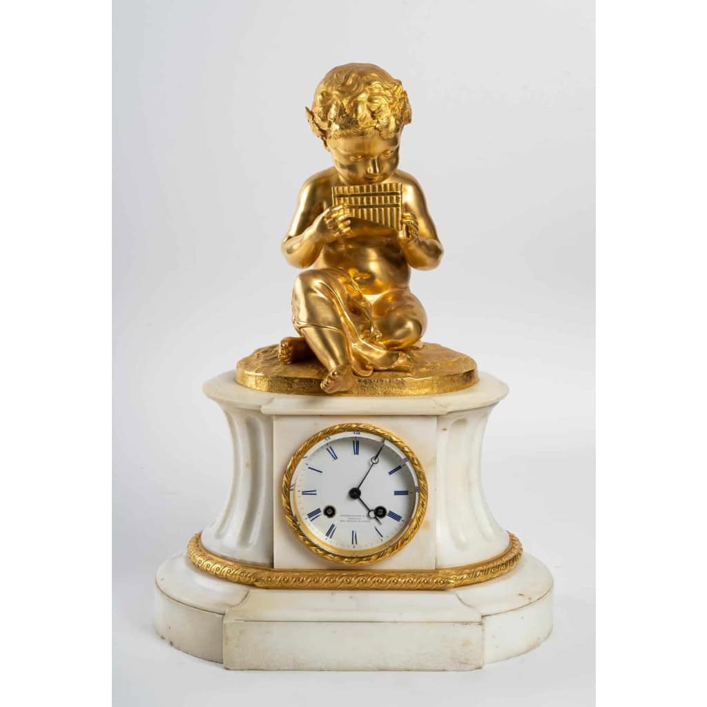 Prélude Bacchique:Enfant jouant de la Flûte de Pan.Pendule de Style Louis XVI par la Maison Charpentier. | Biron |||||||||