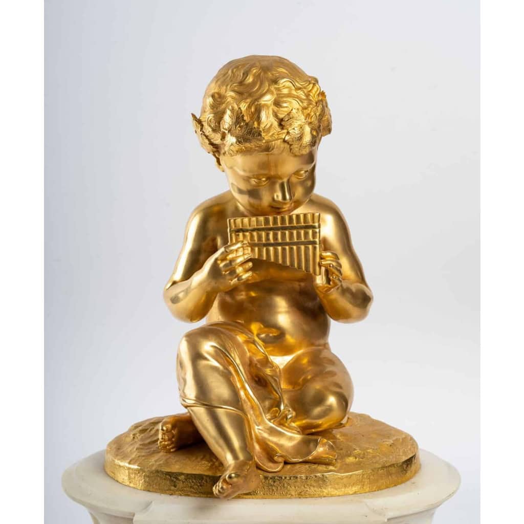 Prélude Bacchique:Enfant jouant de la Flûte de Pan.Pendule de Style Louis XVI par la Maison Charpentier. | Biron Prélude Bacchique:Enfant jouant de la Flûte de Pan.Pendule de Style Louis XVI par la Maison Charpentier.