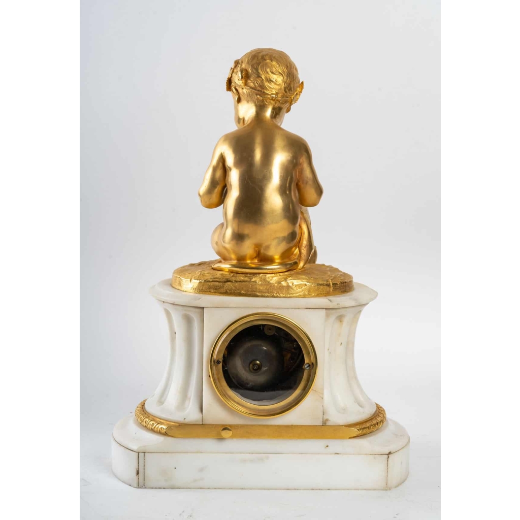 Prélude Bacchique:Enfant jouant de la Flûte de Pan.Pendule de Style Louis XVI par la Maison Charpentier. | Biron Prélude Bacchique:Enfant jouant de la Flûte de Pan.Pendule de Style Louis XVI par la Maison Charpentier.