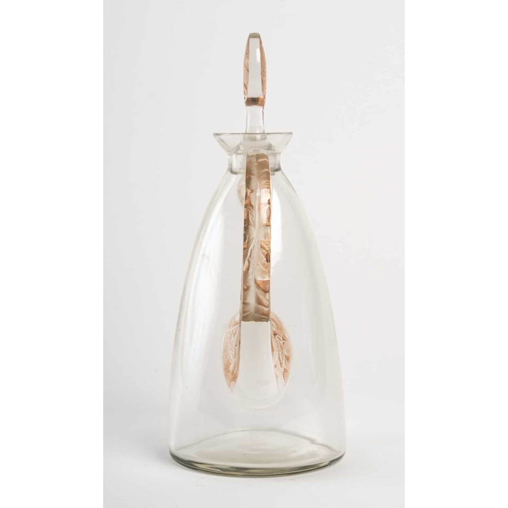 Carafe « Prunelles » verre blanc patiné sépia de René LALIQUE pour Cusenier | Biron Carafe "Prunelles" verre blanc patiné sépia de René LALIQUE pour Cusenier