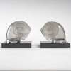 Paire Mascottes Serre-livres « Tête De Bélier » verre blanc sur socle verre noir de René LALIQUE | Biron |||||||||