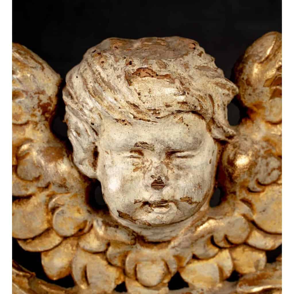 Trois têtes d’ange en bois doré, XVIIIème | Biron Trois têtes d'ange en bois doré, XVIIIème