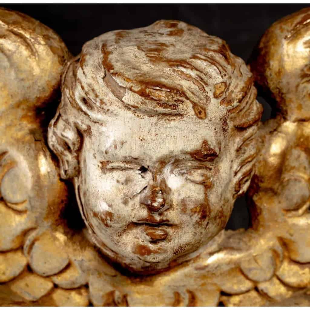 Trois têtes d’ange en bois doré, XVIIIème | Biron Trois têtes d'ange en bois doré, XVIIIème