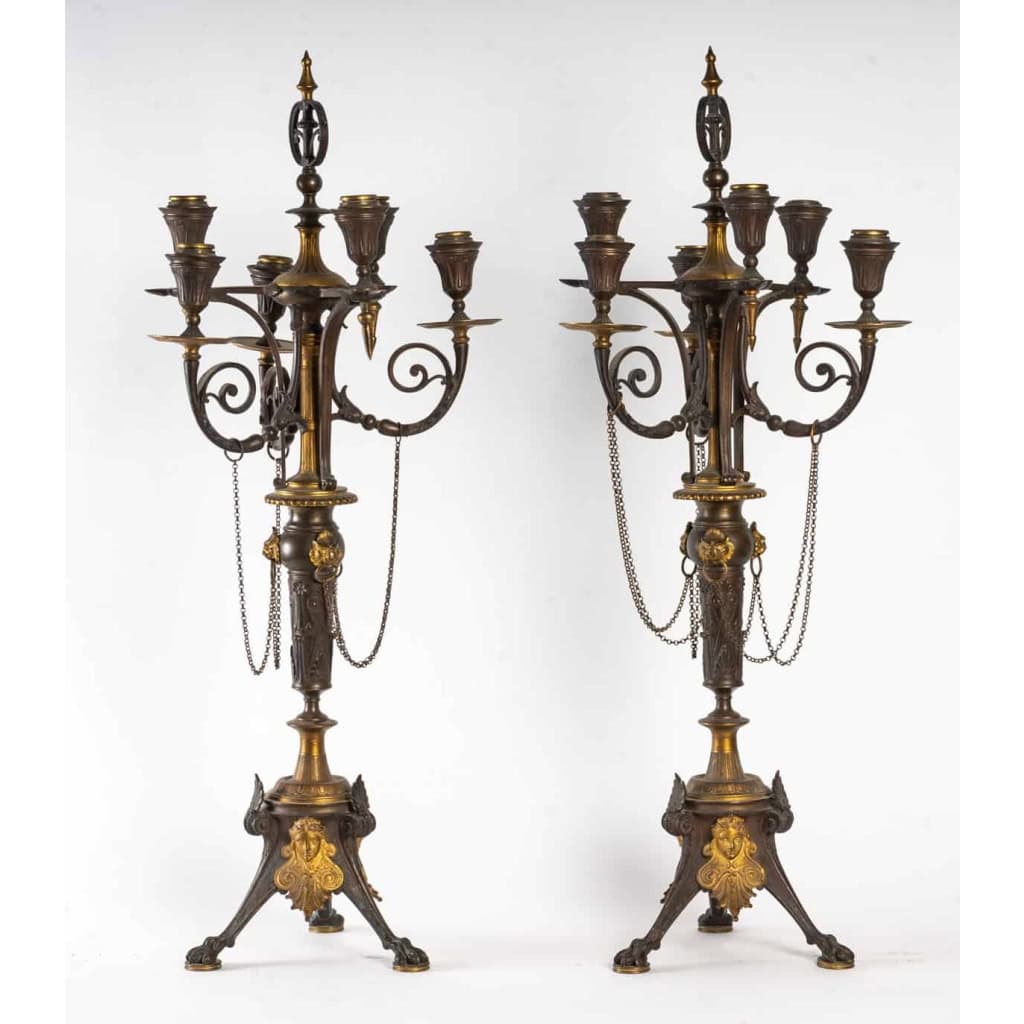 1 paire de bougeoirs de style néo classique ( Double patine brune et dorée )
