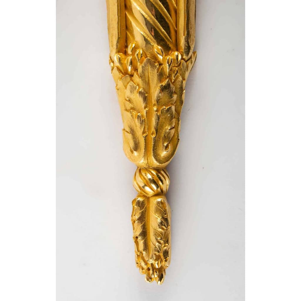 Suite de quatre appliques de style Louis XVI. | Biron Suite de quatre appliques de style Louis XVI.