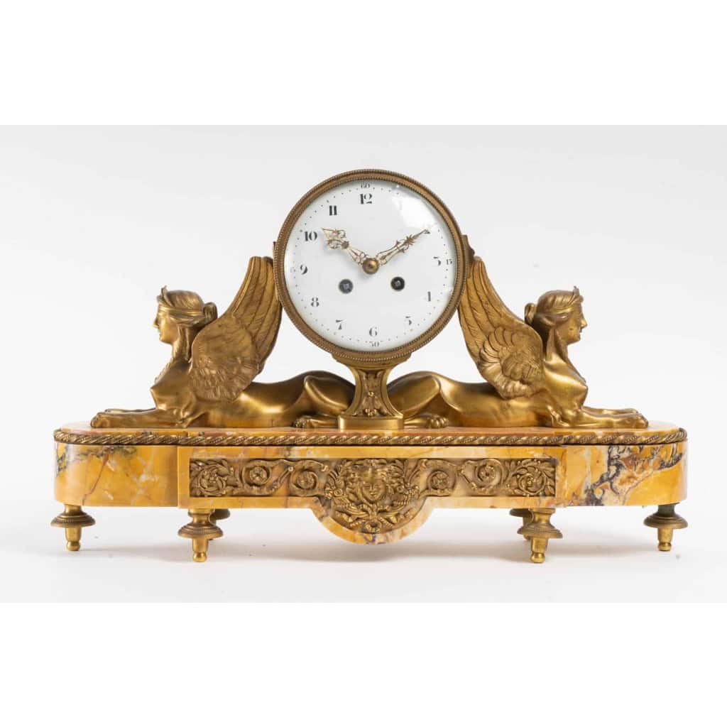 Pendule Napoléon III en bronze doré et marbre | Biron |||||||