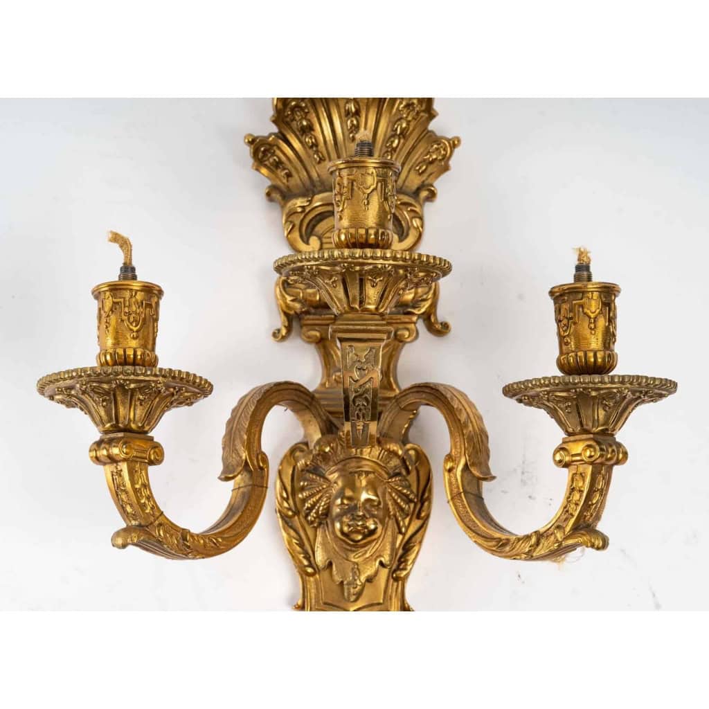 Série de 4 appliques Bronze doré poli vernis or style Louis XIV , 3 branches lumière